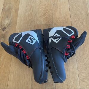 SALOMON kids Black and Gray Ski Boots with Red Accents